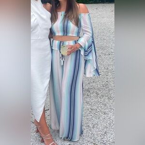 Two Piece Set. Striped & flared. Worn one time and dry cleaned. Size small